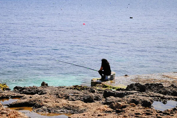 Malta | Wędkarz w Qawra Malta | Wędkarz w Qawra